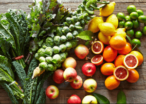 a group of fruits and vegetables on a wood surface Healthy Weight Loss Diets Olney